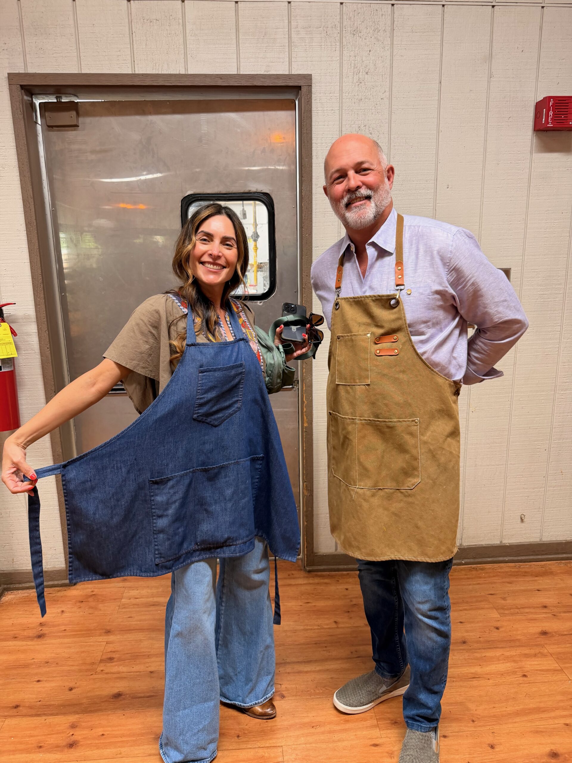 Christian couple serving at a marriage retreat, sharing about healing emotional triggers and childhood beliefs in marriage through faith